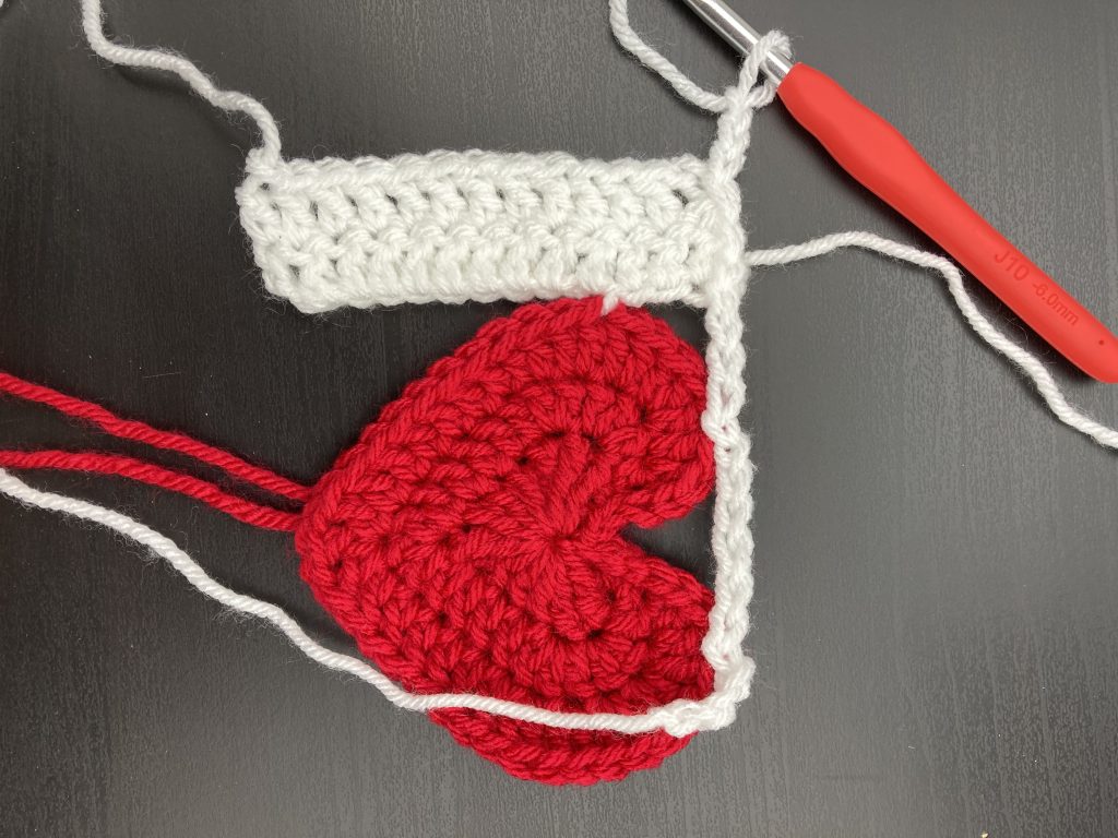 adding the second panel of the log cabin love block