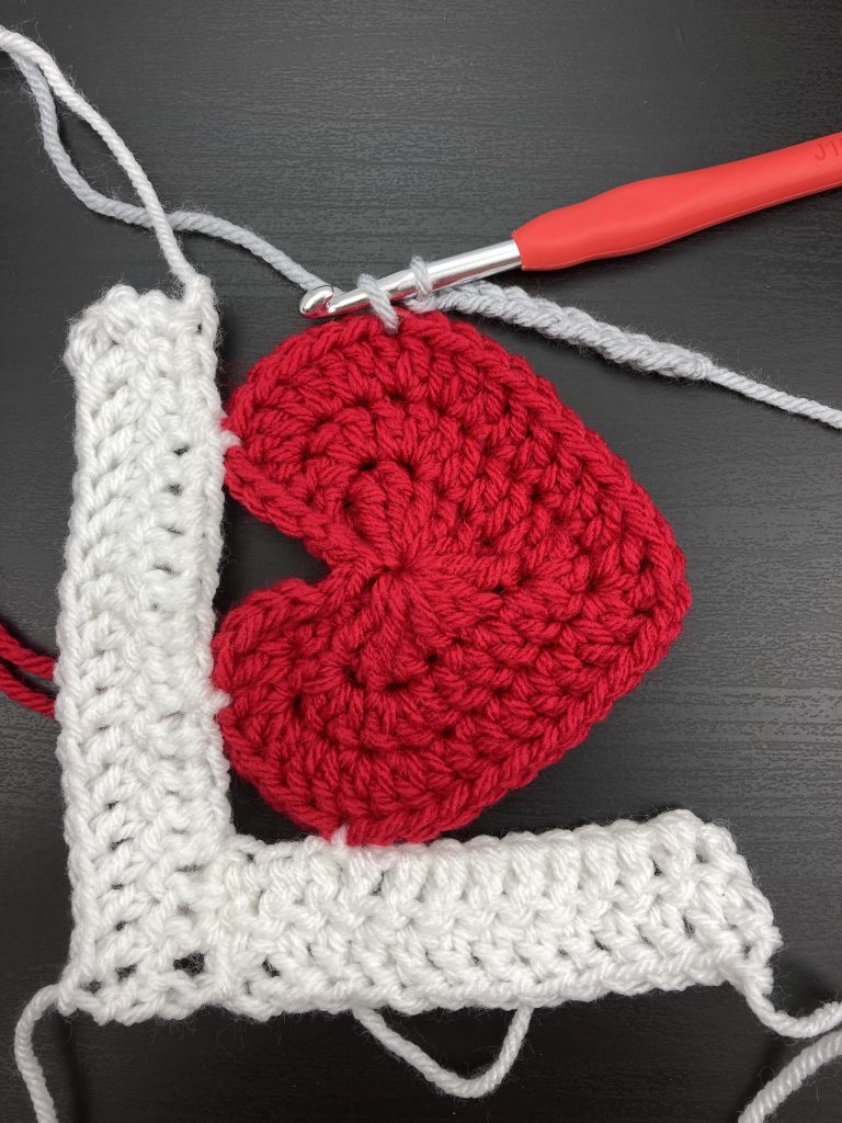 adding the third panel of the log cabin love block