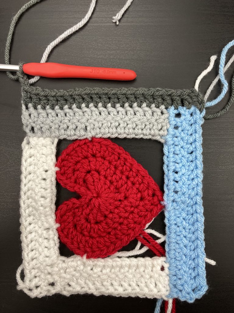 fifth panel of the log cabin love block