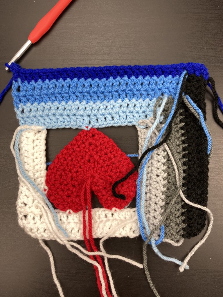 adding the final panel to the log cabin love block